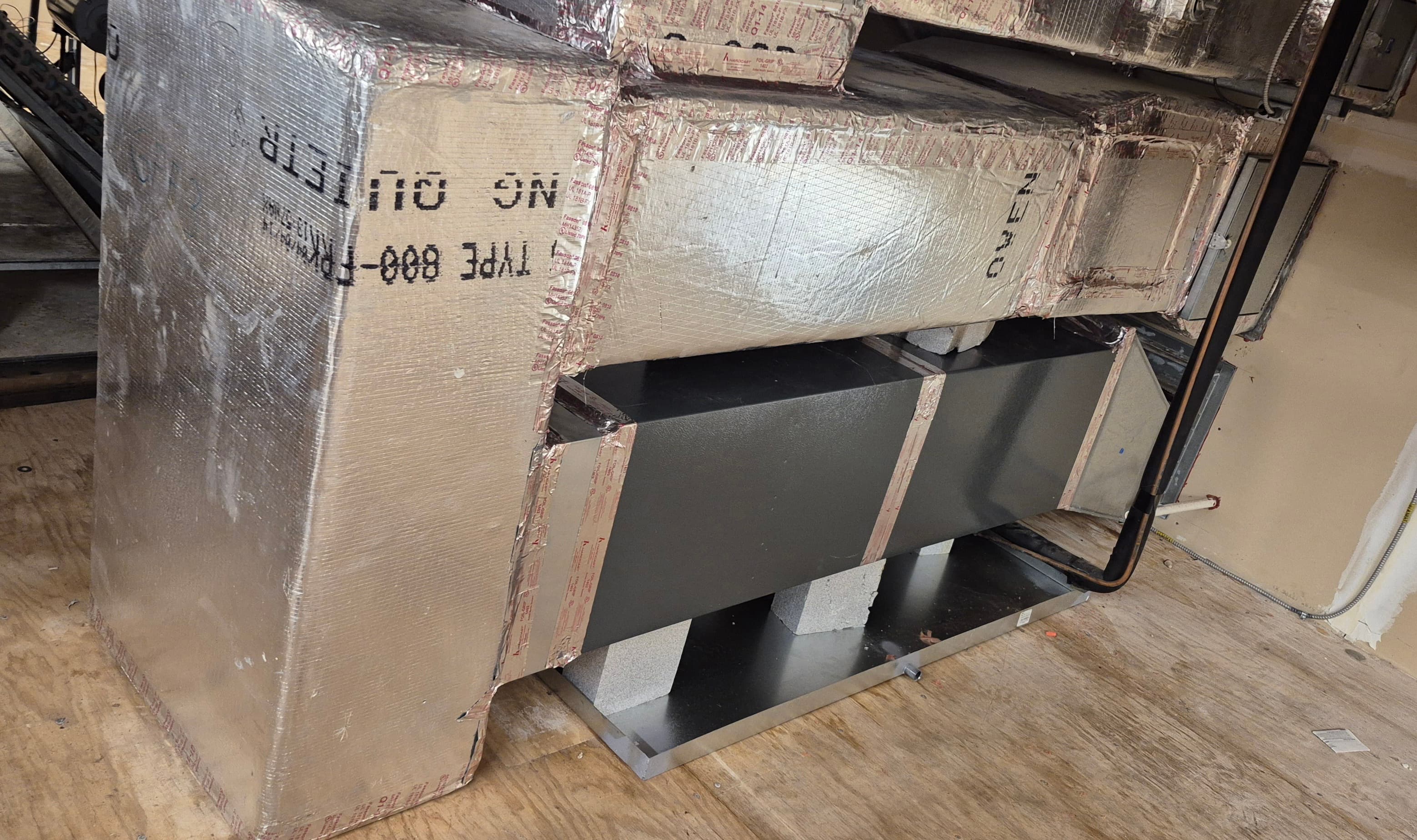 Gas furnace and evaporator coil connected to ductwork