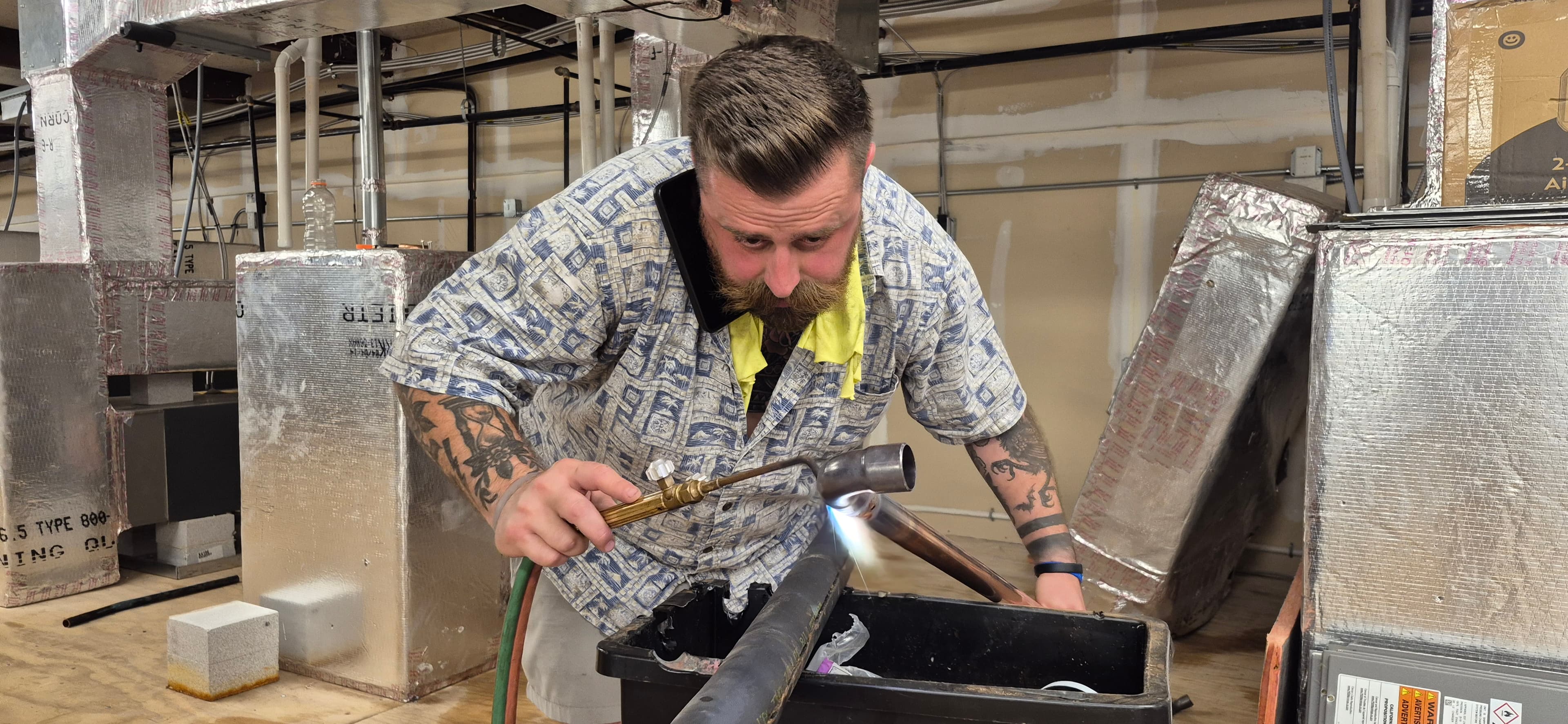 ProPoint HVAC technician at work on a copper line set